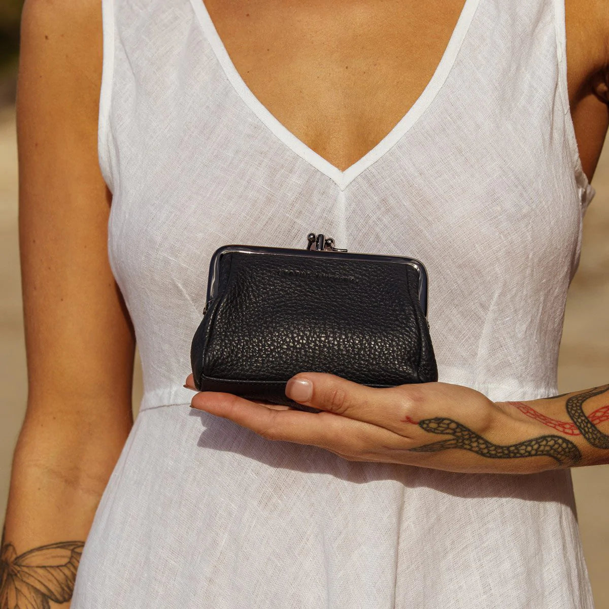 Status Anxiety Volatile Purse Into Jeans